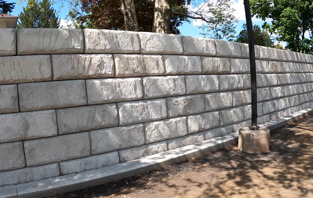 Beautiful white concrete block retaining wall with professional finish
